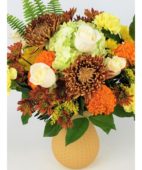 fall-toned centerpiece in gilded glass compote dish