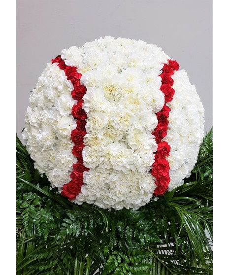 Solid floral  in shades of yellow, white, and green featuring roses, calla lily, and other premium accents.Approximate size of the standard design is 18