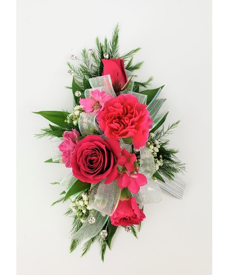 A designers choice of mixed floral blooms in your choice of colors. Includes keepsake Rhinestone wristlet, crystal pins, and accents!