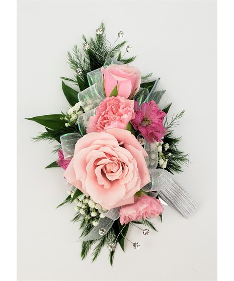 A designers choice of mixed floral blooms in your choice of colors. Includes keepsake Rhinestone wristlet, crystal pins, and accents!