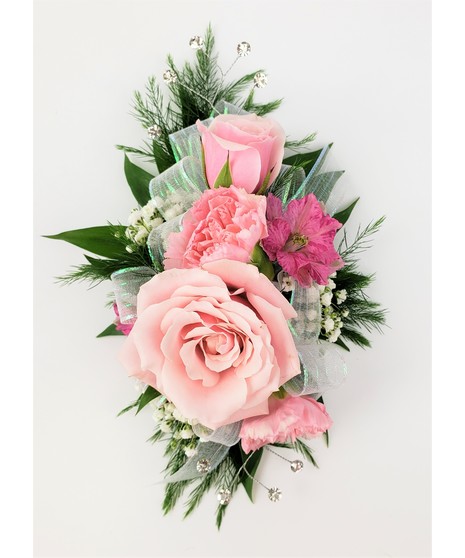 A designers choice of mixed floral blooms in your choice of colors. Includes keepsake Rhinestone wristlet, crystal pins, and accents!