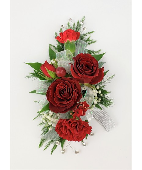 A designers choice of mixed floral blooms in your choice of colors. Includes keepsake Rhinestone wristlet, crystal pins, and accents!