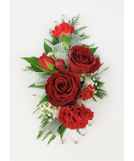 A designers choice of mixed floral blooms in your choice of colors. Includes keepsake Rhinestone wristlet, crystal pins, and accents!