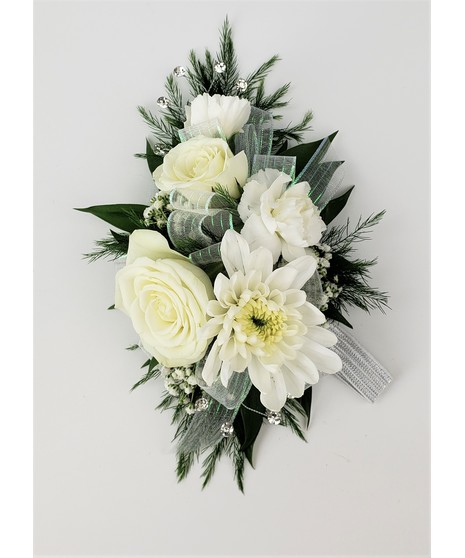 A designers choice of mixed floral blooms in your choice of colors. Includes keepsake Rhinestone wristlet, crystal pins, and accents!