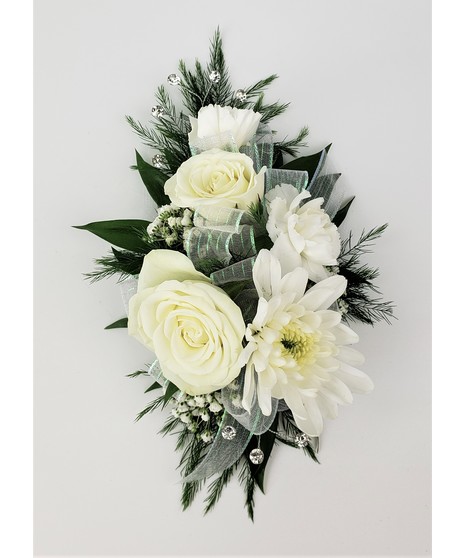 A designers choice of mixed floral blooms in your choice of colors. Includes keepsake Rhinestone wristlet, crystal pins, and accents!