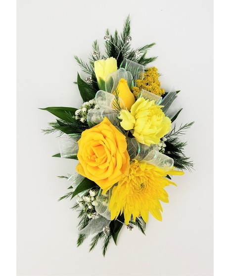 A designers choice of mixed floral blooms in your choice of colors. Includes keepsake Rhinestone wristlet, crystal pins, and accents!